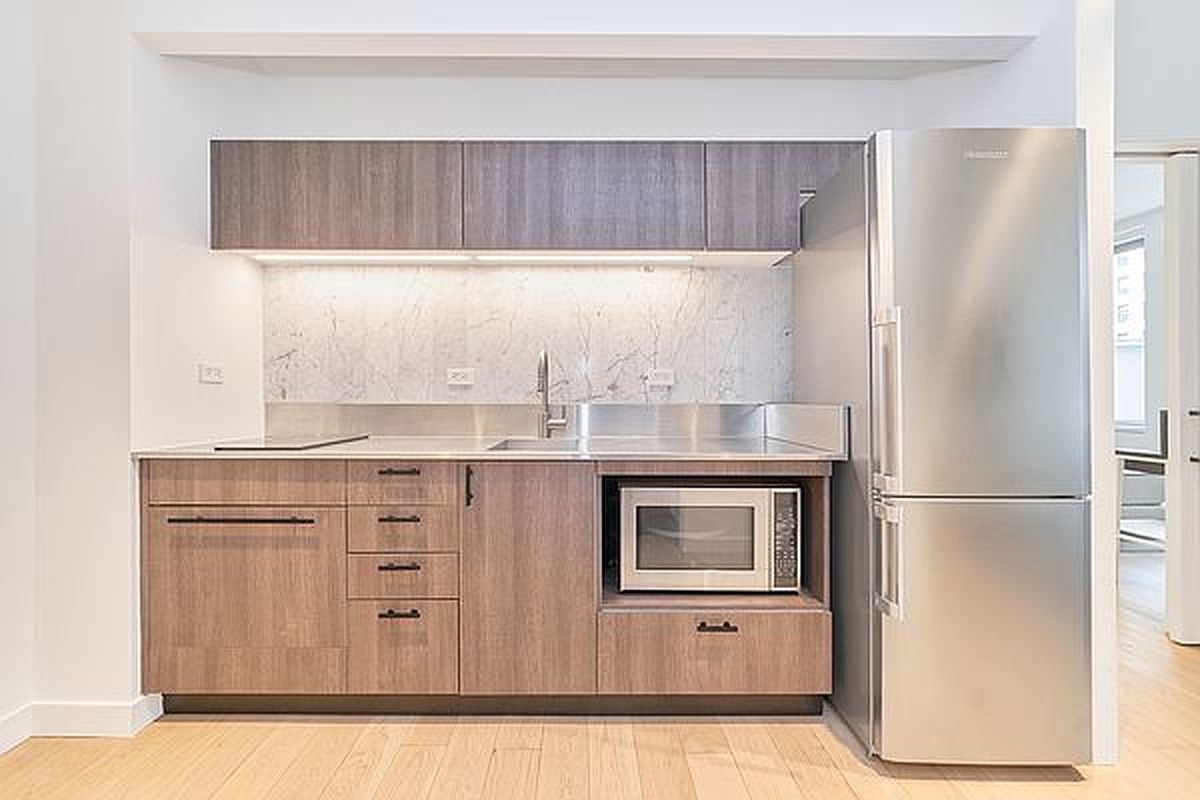 Property Photo: 84 William Street 1002 NY 10038