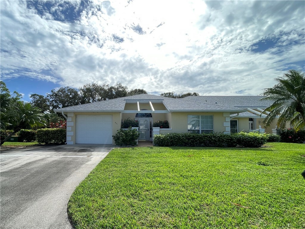 Property Photo:  831 Lake Orchid Circle 831  FL 32962 