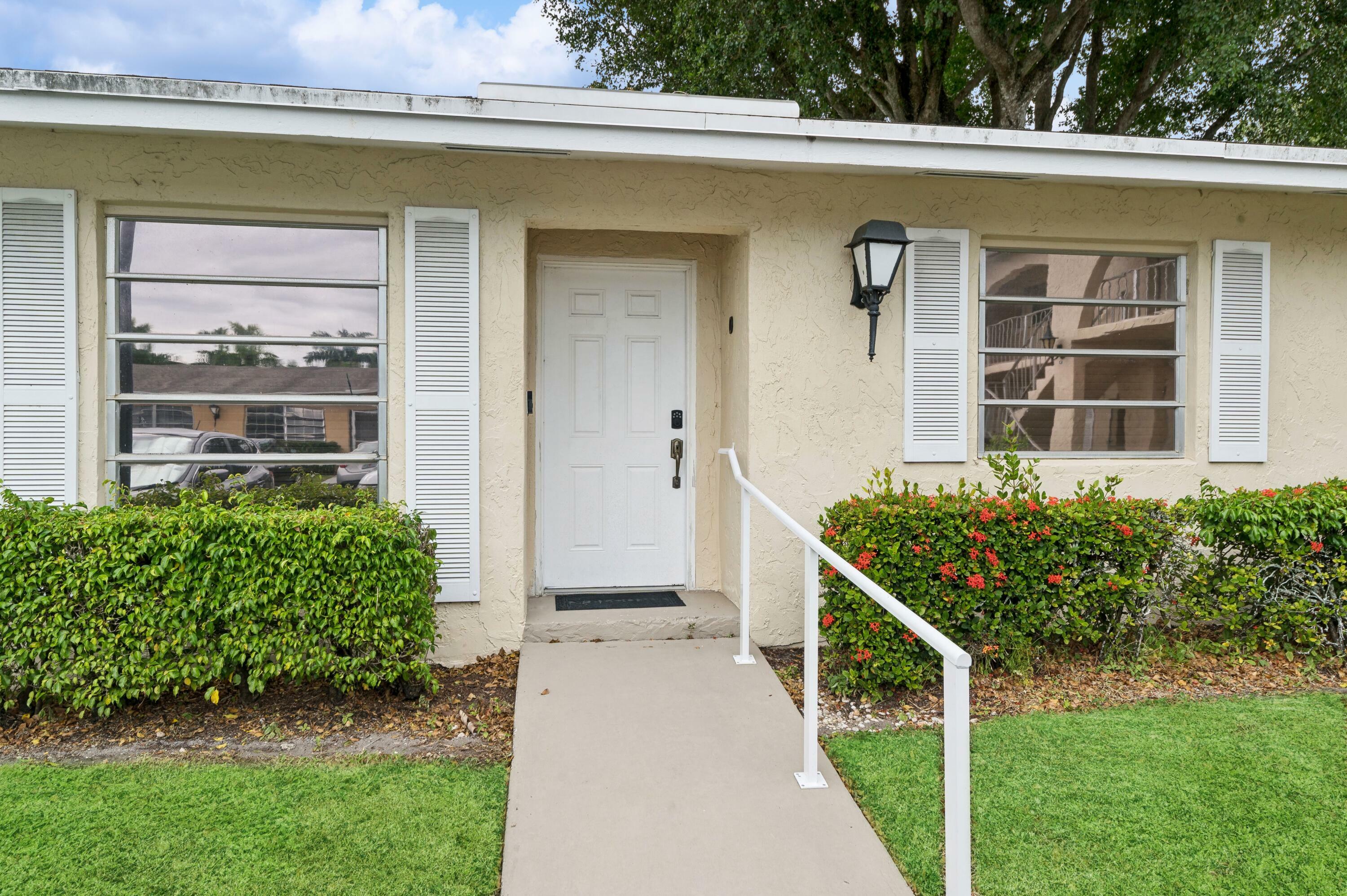 Property Photo:  13725 Flora Place D  FL 33484 