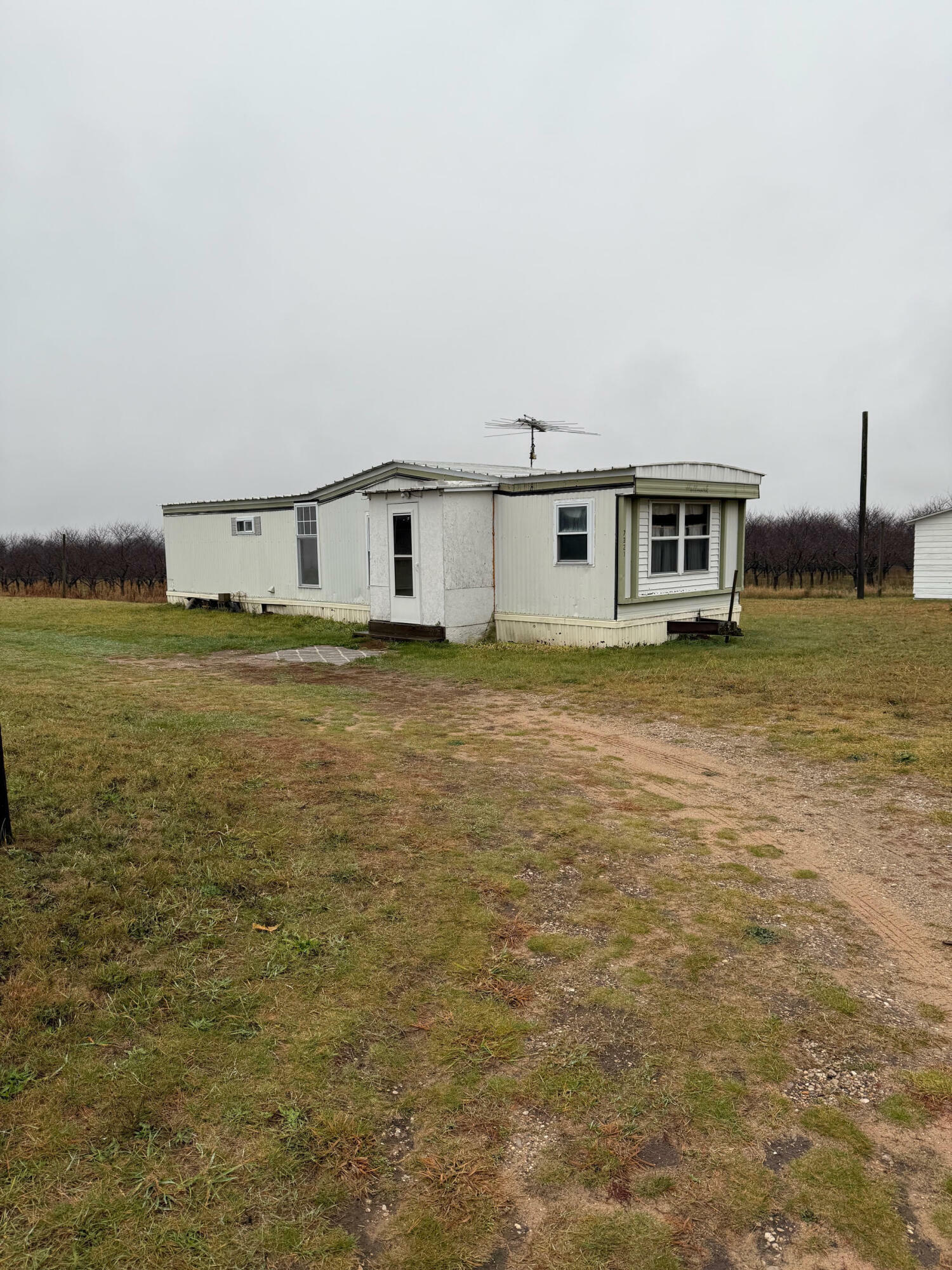 Property Photo:  7321 Eight Mile Road  MI 49645 