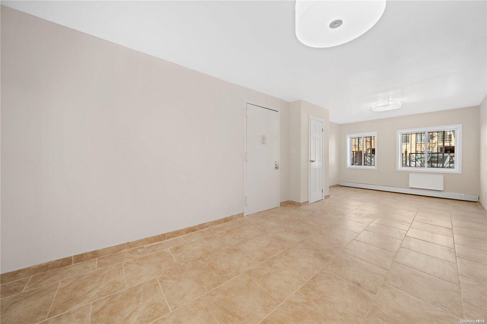 Property Photo: 55-10 102nd Street 1A1 NY 11368