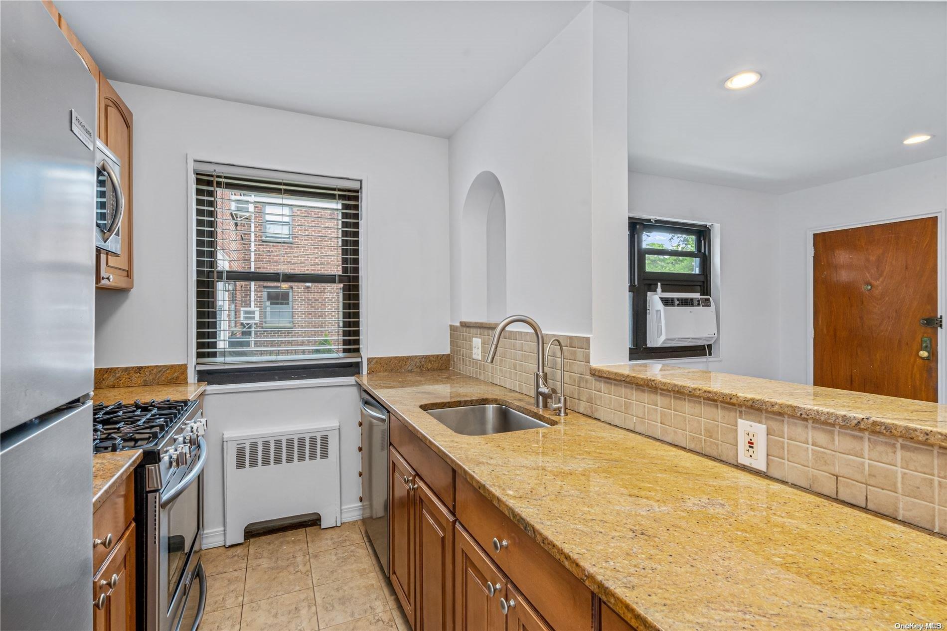 Property Photo: 163-39 Willets Point Boulevard 5-173 NY 11357