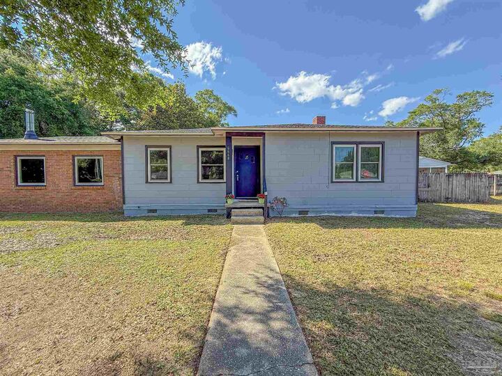 Property Photo:  6668 Maple St  FL 32570 