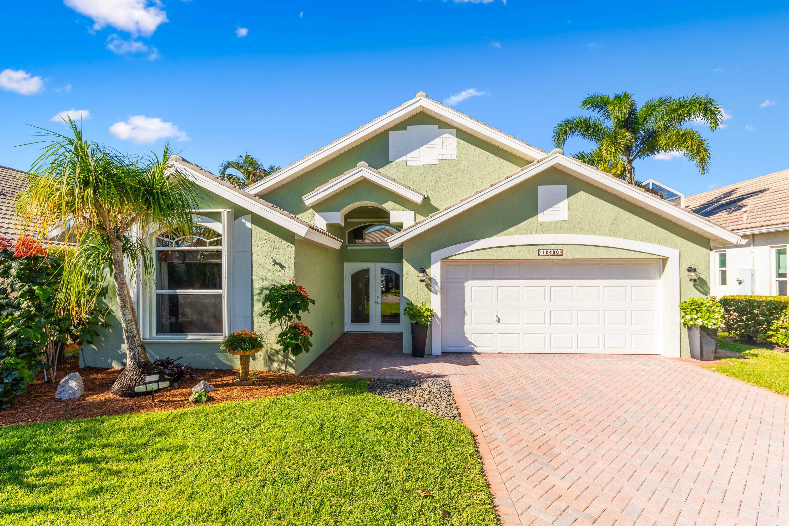 Property Photo:  12480 SE Plandome Drive  FL 33455 