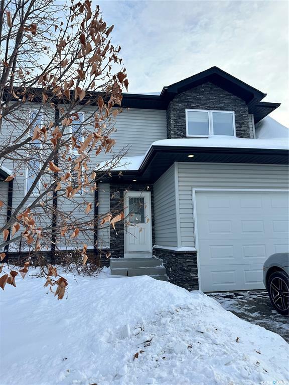 Property Photo:  547 East Hampton Boulevard  SK S7R 0H8 