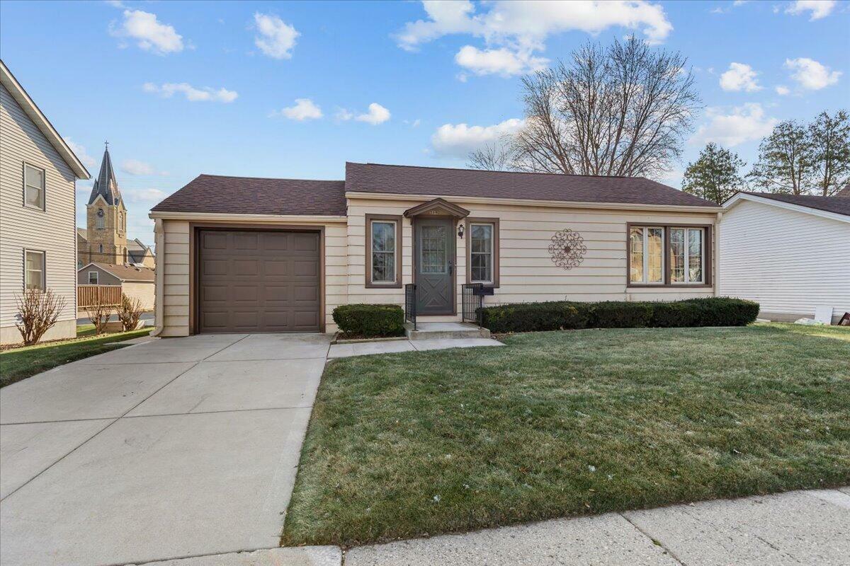 Property Photo:  319 1st St  WI 53040 