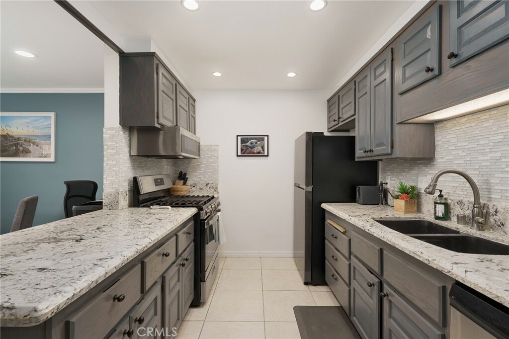 Property Photo:  6600 Warner Avenue 247  CA 92647 