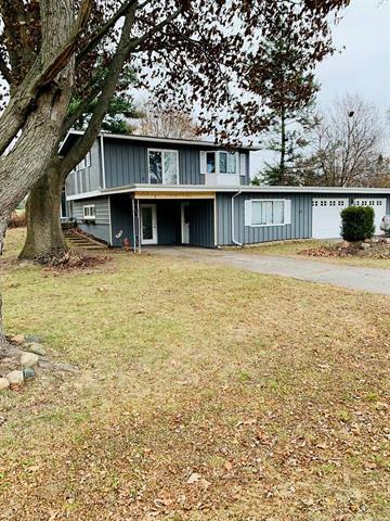 Property Photo:  647 Ridgeview Drive  MI 48817 