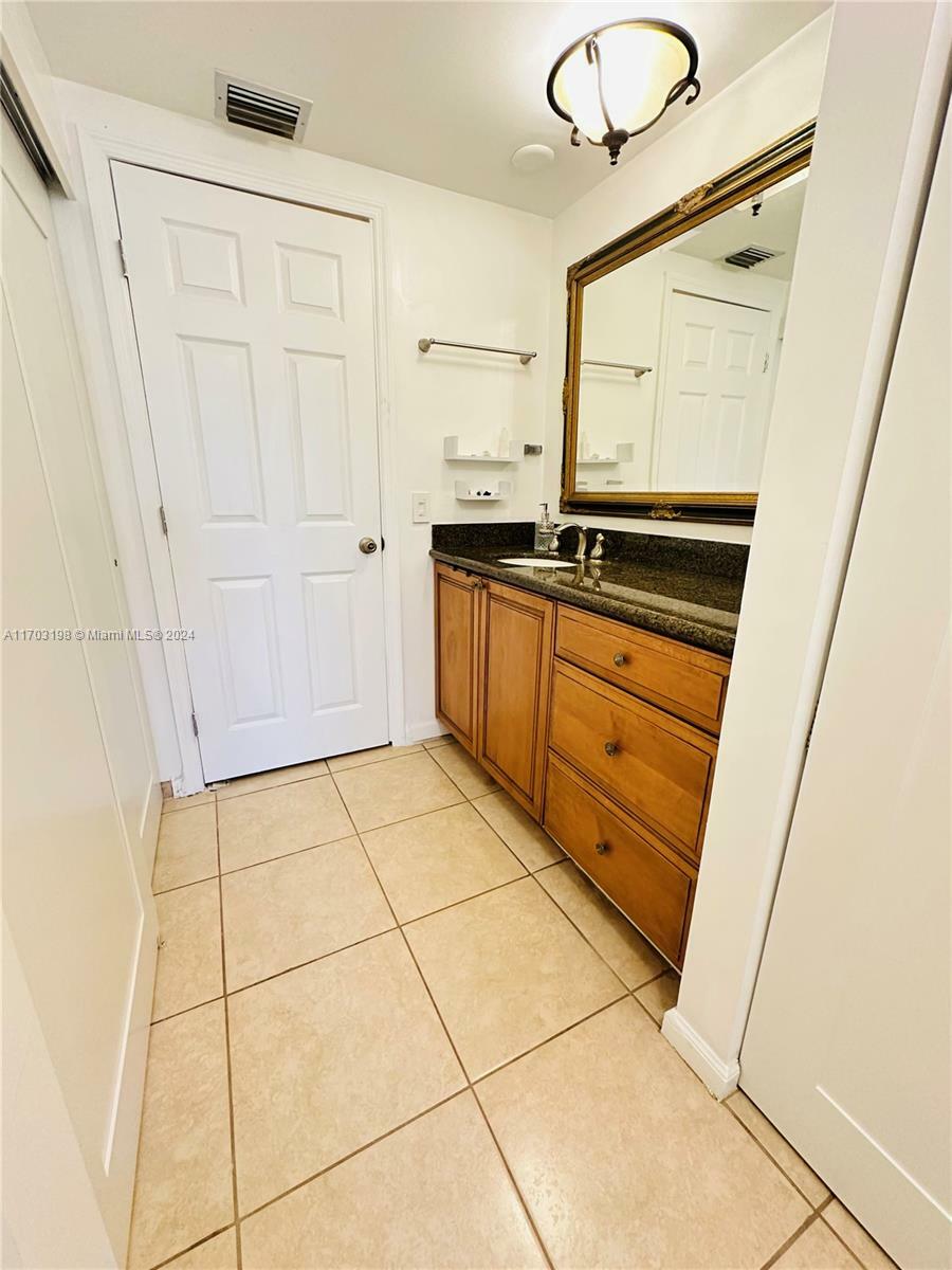 Property Photo:  900 Greensward Ln 111-G  FL 33445 