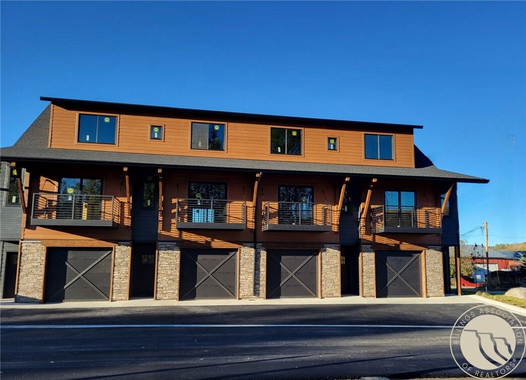 Property Photo:  1 A Timberline Townhomes  MT 59068 