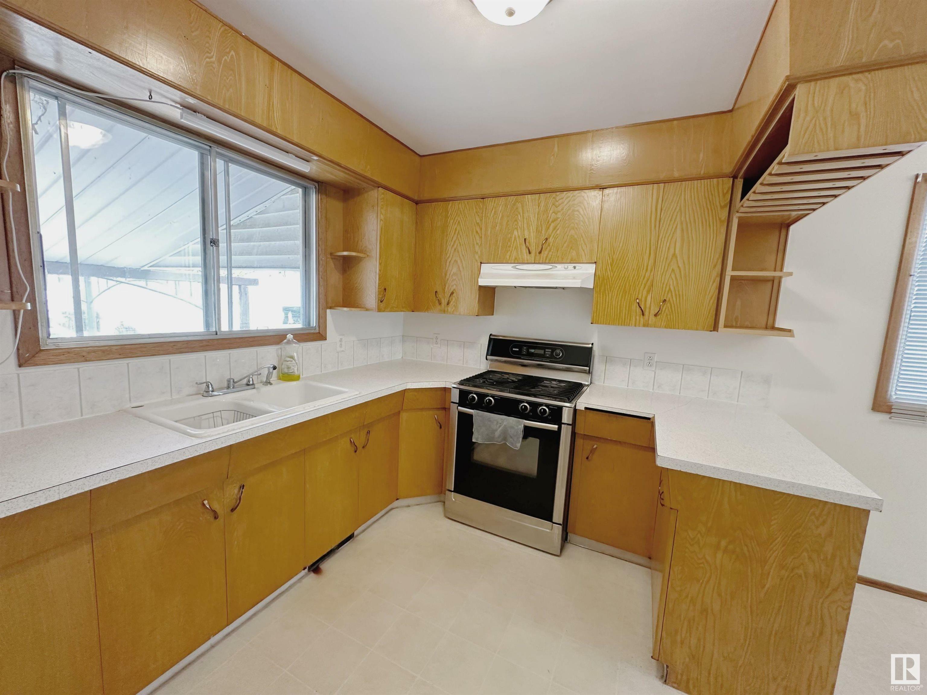 Property Photo:  10570 62 Avenue NW  AB T6H 1M4 