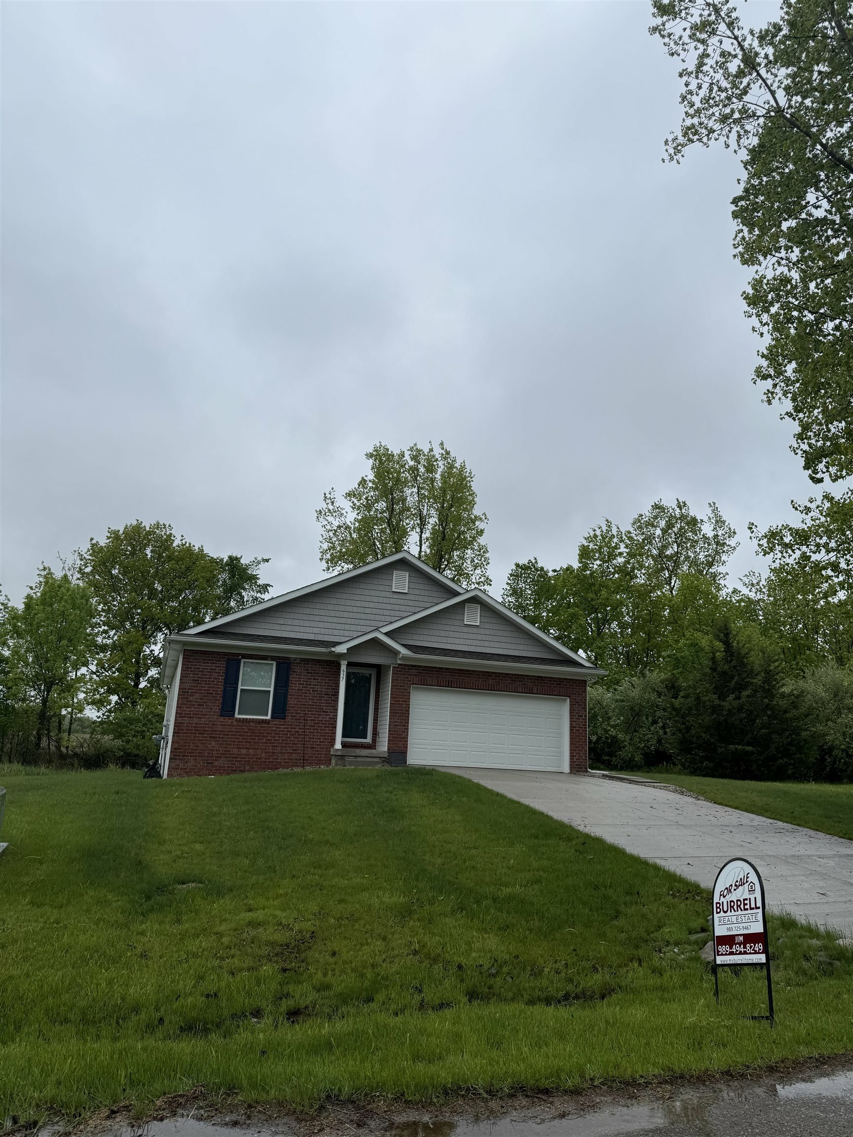 Property Photo: 637 Woodvalley Drive MI 48817