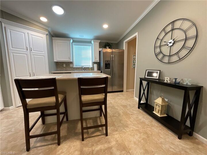 Property Photo:  423 Palm Dr 313  FL 34114 