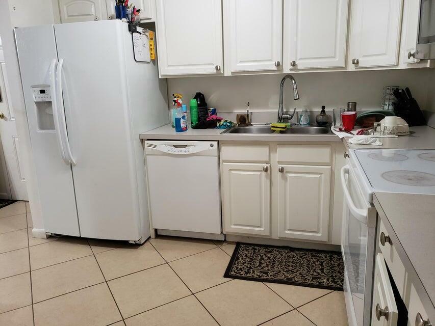 Property Photo:  475 SE 8th Street 114  FL 33441 