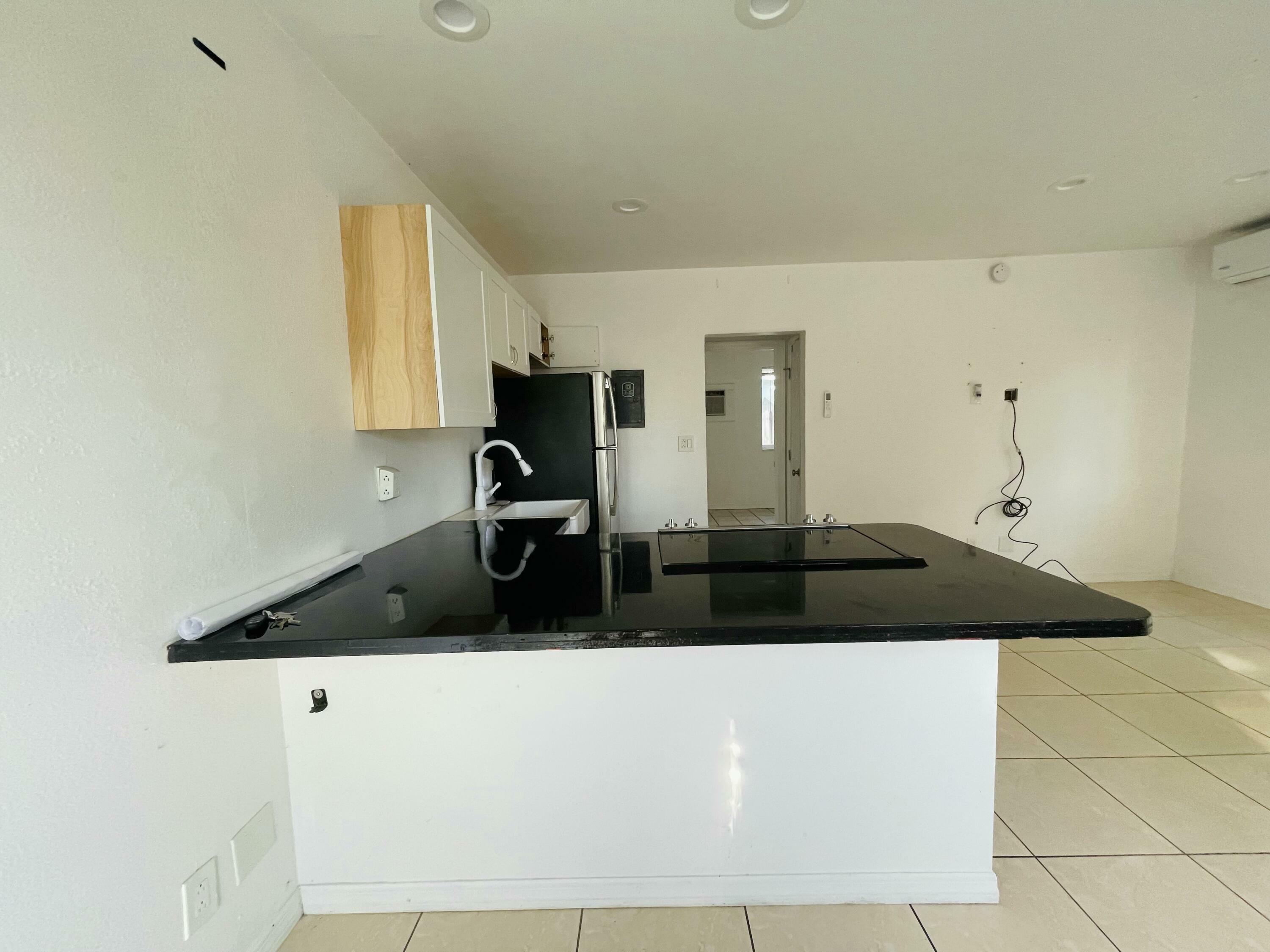 Property Photo:  456 Royal Poinciana Boulevard 1  FL 33070 