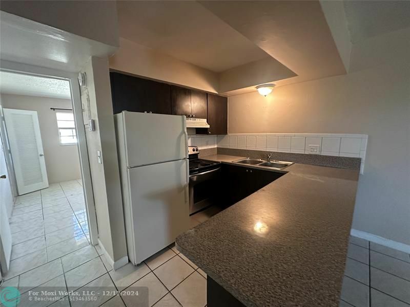 Property Photo:  741 SW 9th St 212  FL 33060 