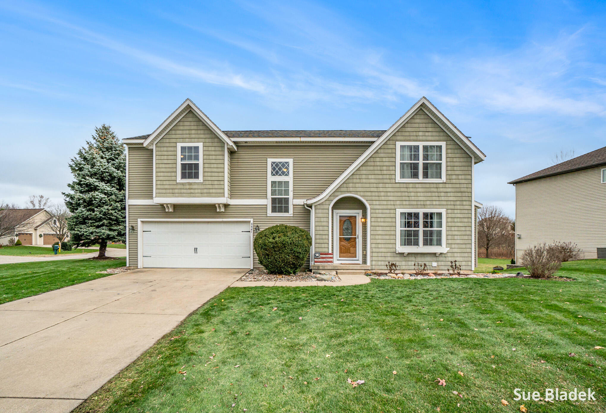 Property Photo:  8641 Suntree Drive  MI 49464 