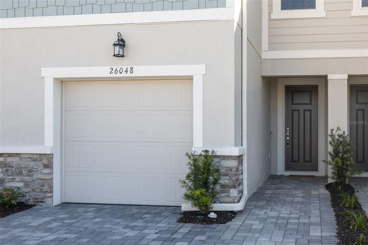 Property Photo: 26048 Woven Wicker Bend Bend FL 33559