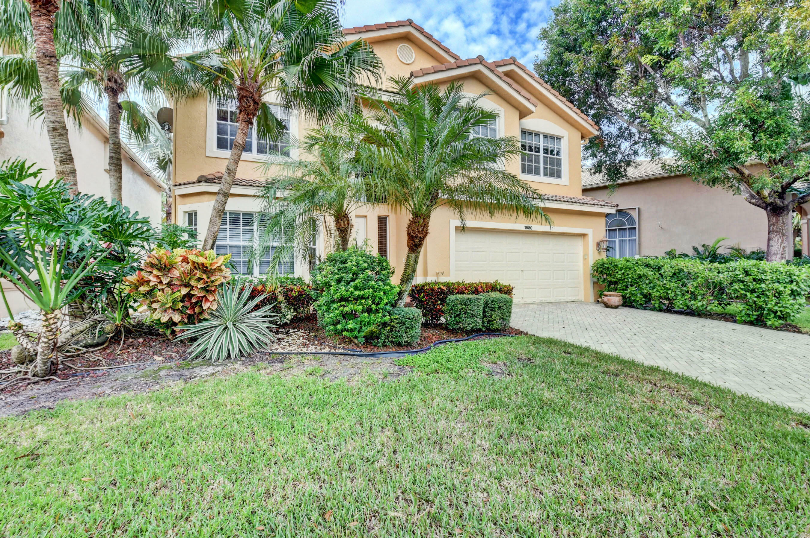 Property Photo:  1680 E Classical Boulevard  FL 33445 