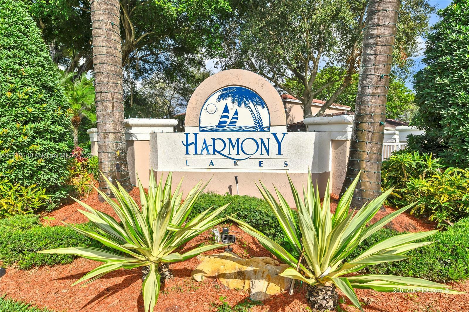 Property Photo:  1663 E Harmony Lake Cir .  FL 33324 