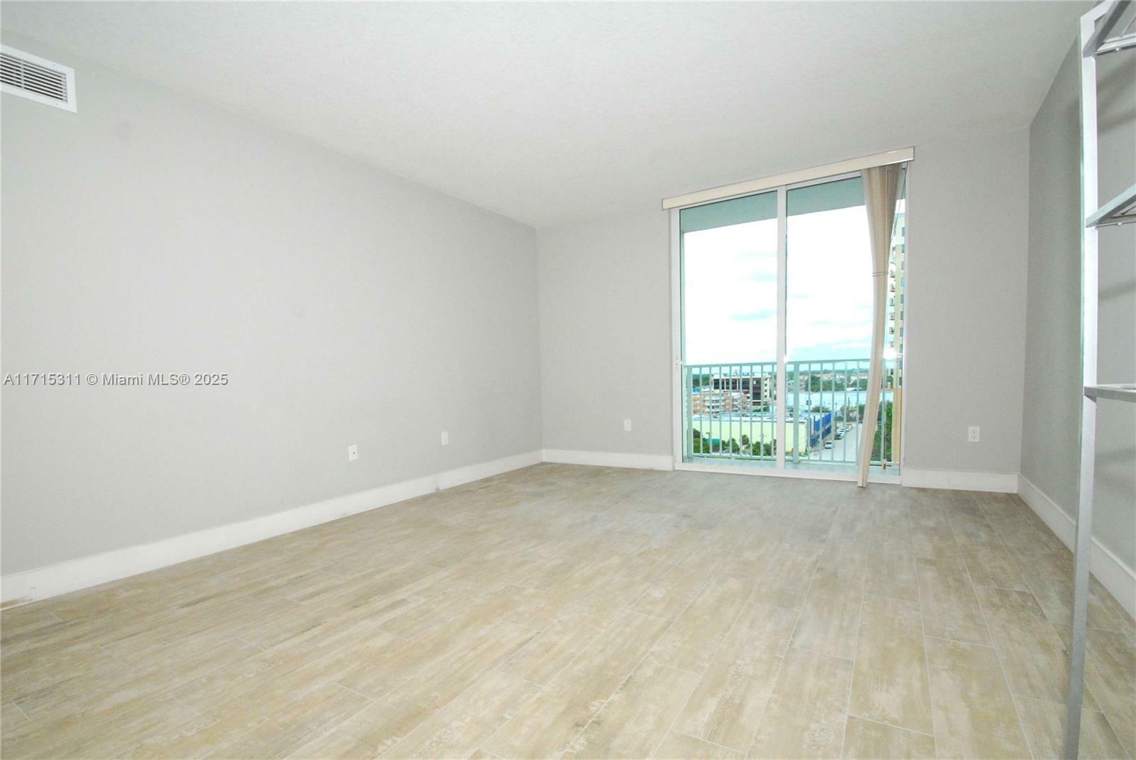 Property Photo:  117 NW 42nd Ave 706  FL 33126 