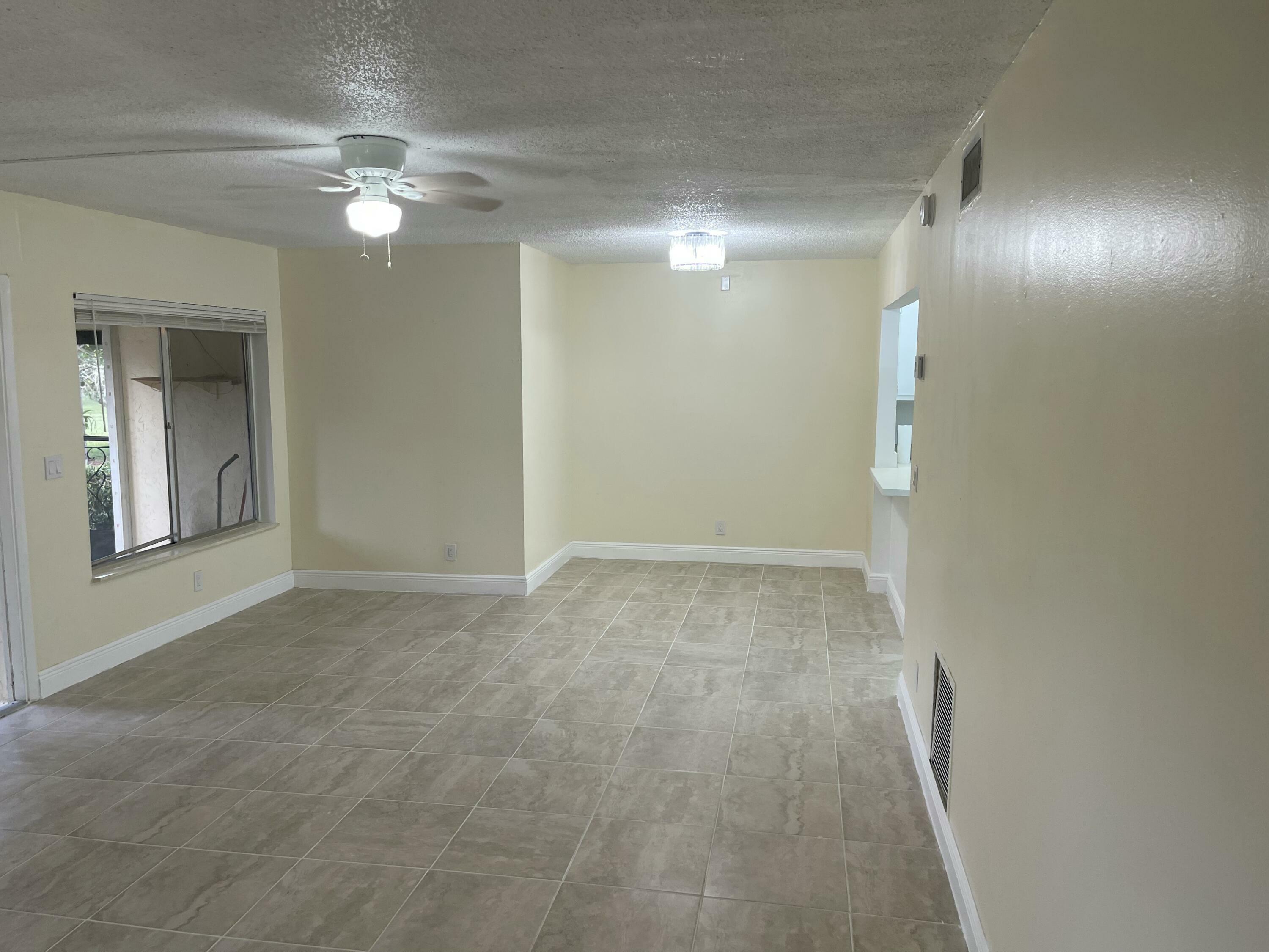 Property Photo:  5830 Whispering Pine B1 Way B-1  FL 33463 