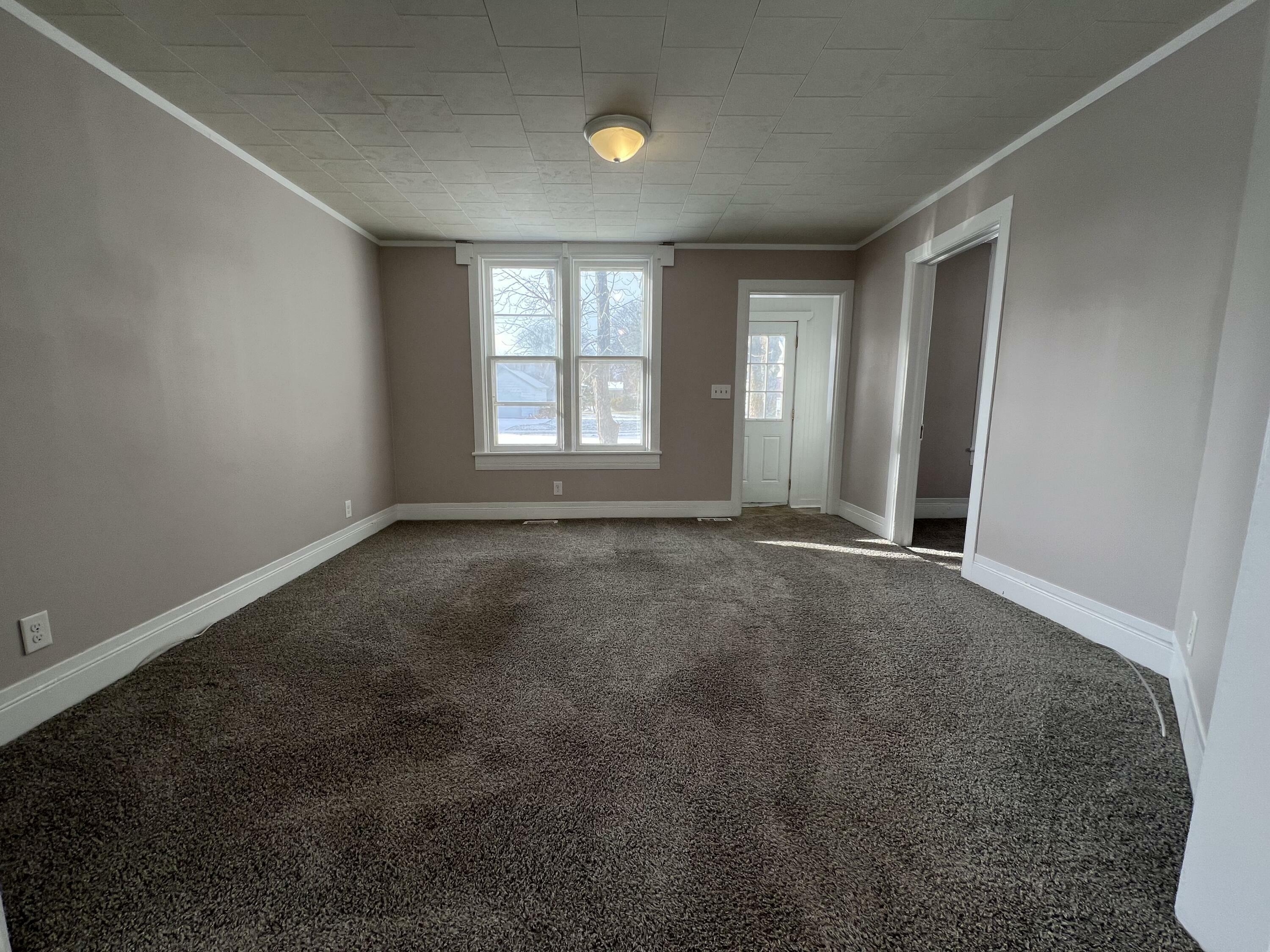 Property Photo:  210 N Ball Street  MI 49721 