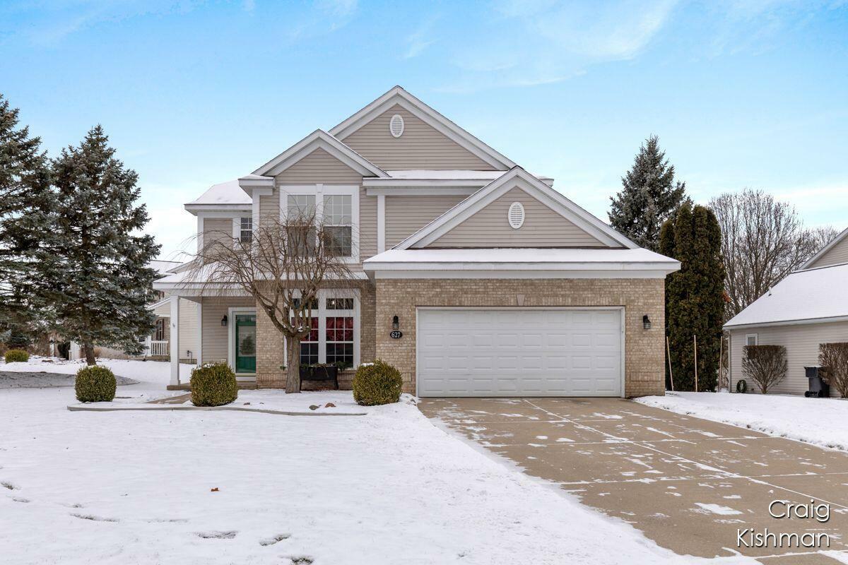 Property Photo:  627 Hartfield Drive SE  MI 49301 