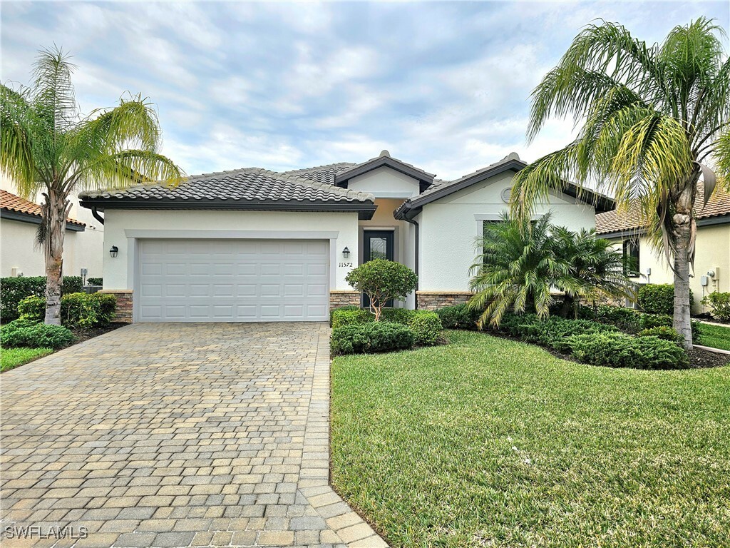 Property Photo: 11572 Shady Blossom Drive FL 33913