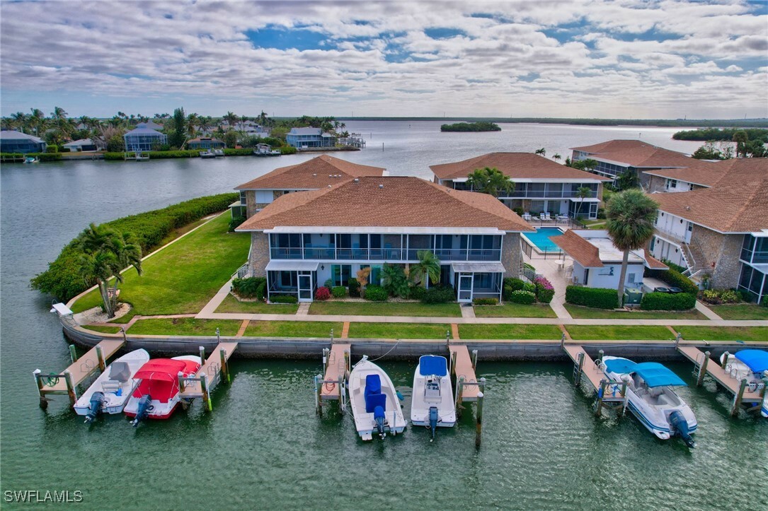 Property Photo:  330 Kon Tiki Drive E7  FL 34113 