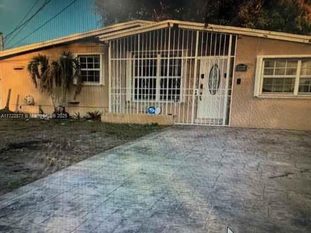 Property Photo:  18611 NW 28th Pl  FL 33056 