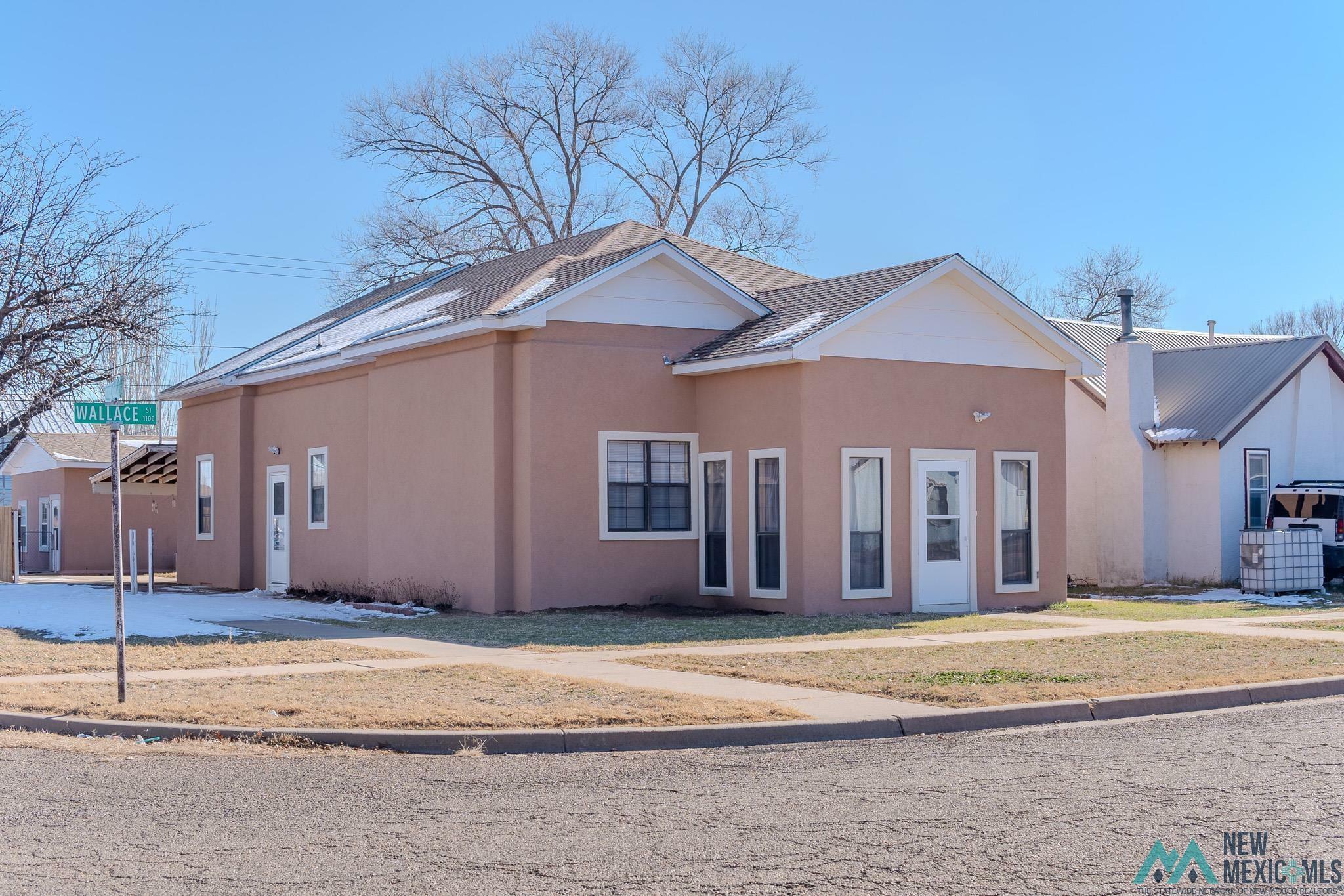 Property Photo:  1121 Wallace + 509 E 12th Street  NM 88101 