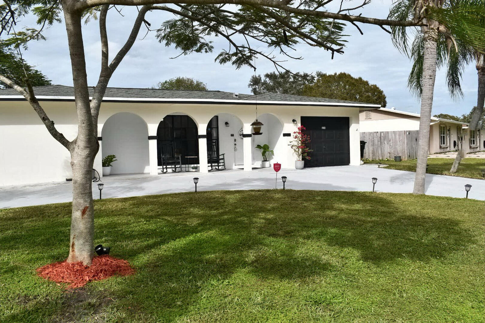 Property Photo:  234 NE Surrey Street  FL 34983 