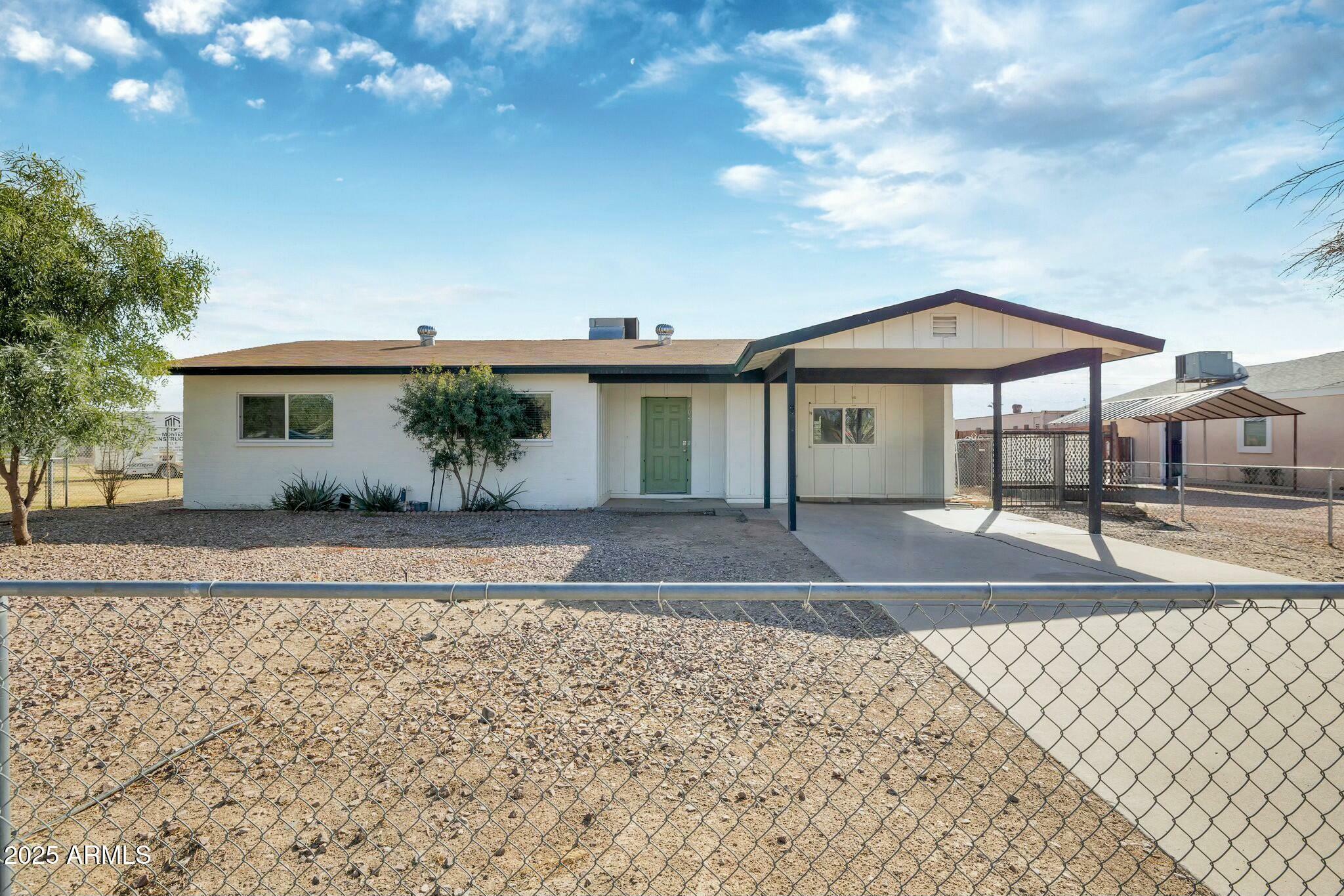 Property Photo:  105 W Baseline Road  AZ 85326 