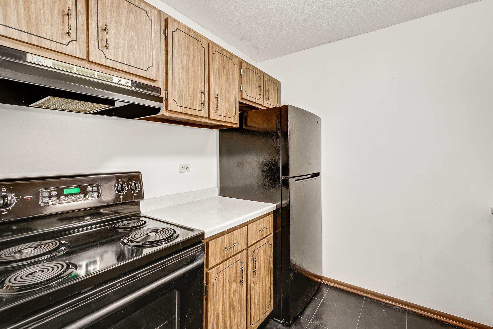 Property Photo:  4045 Hodgson Road 215  MN 55126 