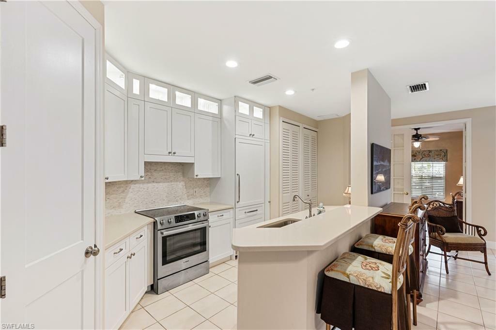 Property Photo: 1325 Sweetwater Cv 103 FL 34110