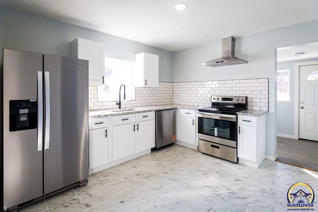 Property Photo: 1951 SW Mission Ave KS 66604
