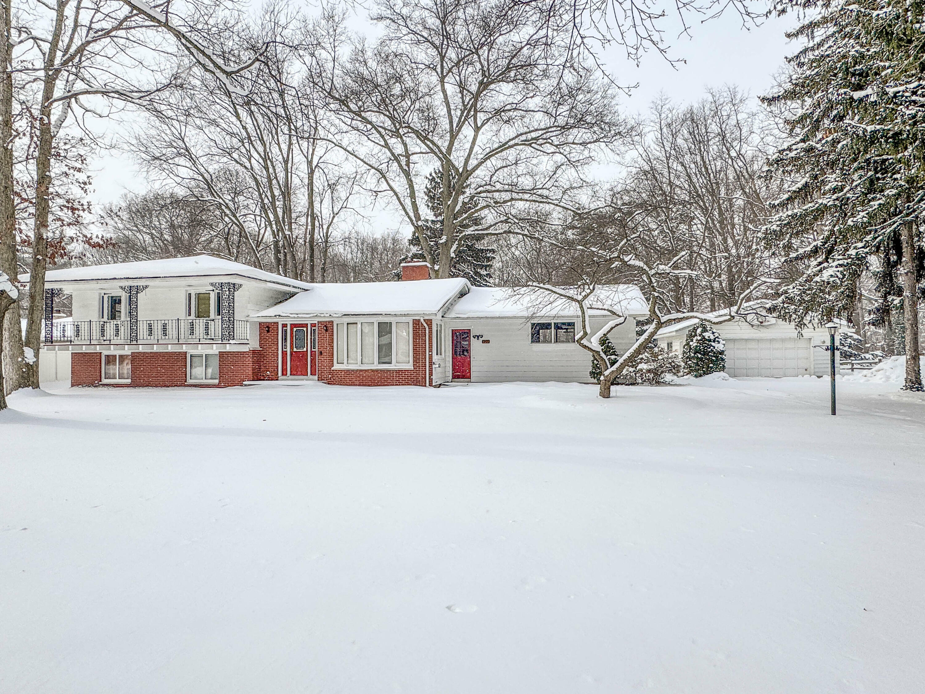 Property Photo:  128 Waukazoo Drive  MI 49424 