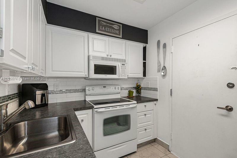 Property Photo:  17800 Atlantic Blvd 203  FL 33160 