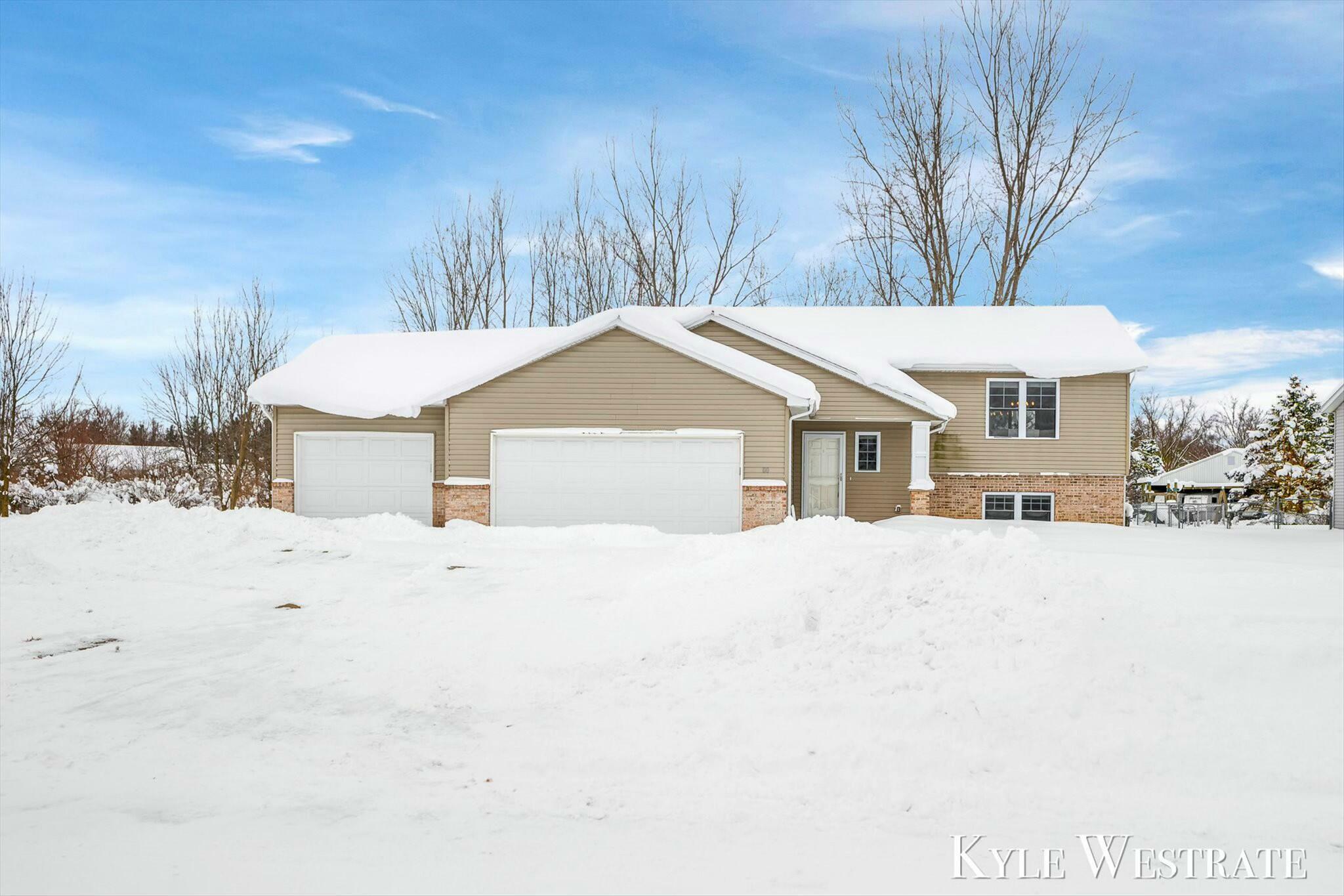 Property Photo:  80 Talon Drive  MI 49404 