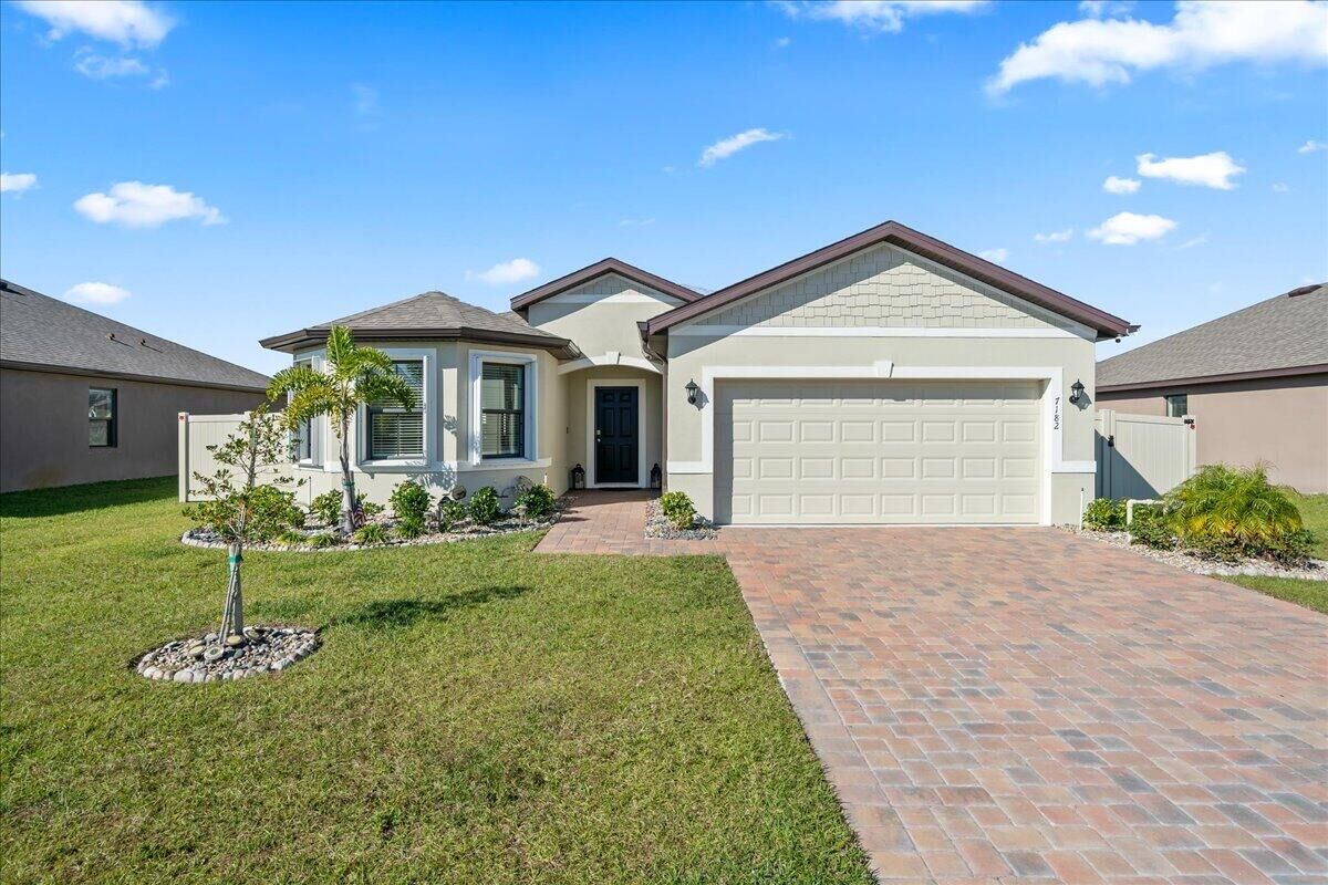 Property Photo:  7182 Tigereye Way  FL 32949 