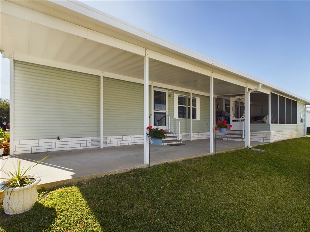 Property Photo:  7660 Kyak Court Q19  FL 32976 
