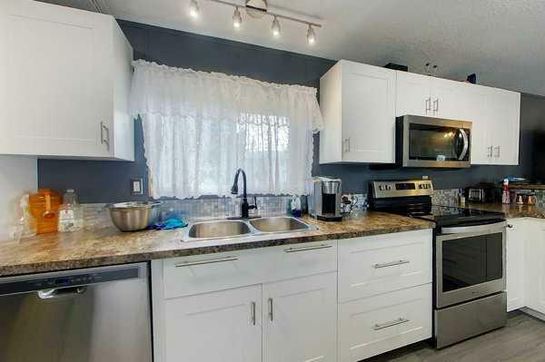 Property Photo: 404 6 Avenue NW #130 AB T0G 2A1