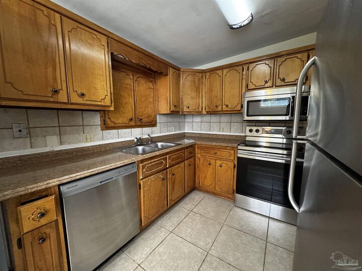 Property Photo:  6518 Robin Ave  FL 32570