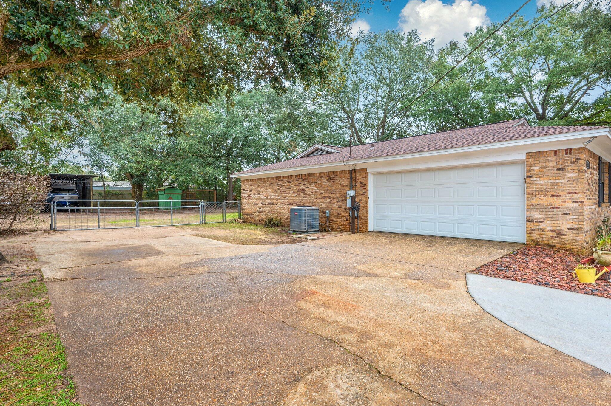 Property Photo:  6020 Oakwood Drive  FL 32570 