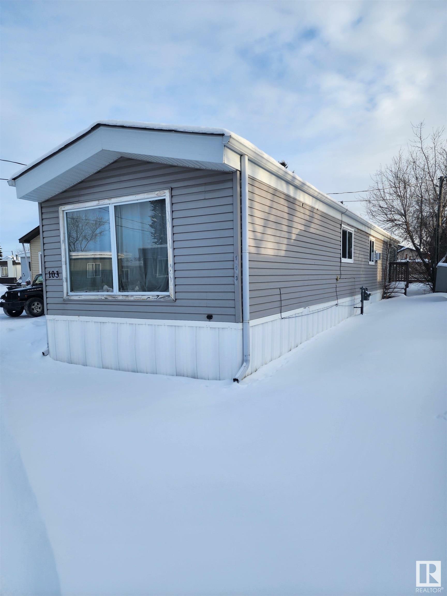 Property Photo:  103 305 Calahoo Road  AB T7X 3K8 