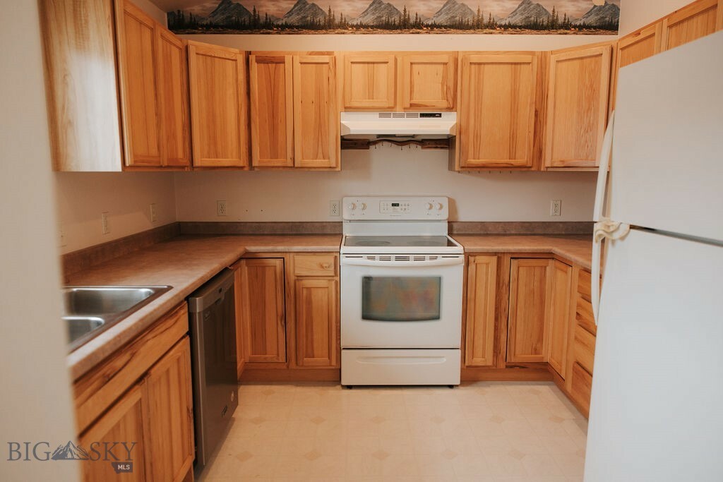 Property Photo: 1202 Wineglass Ct Court H MT 59047