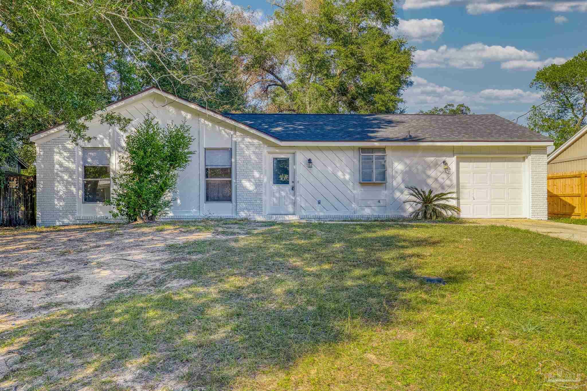 Property Photo:  6017 Syrcle Ave  FL 32570 