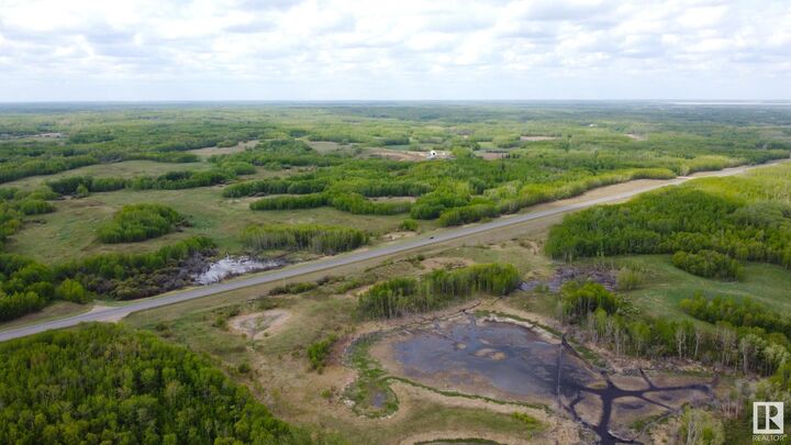 Property Photo: 20255 And 20256 Highway 14 AB T0B 4J0