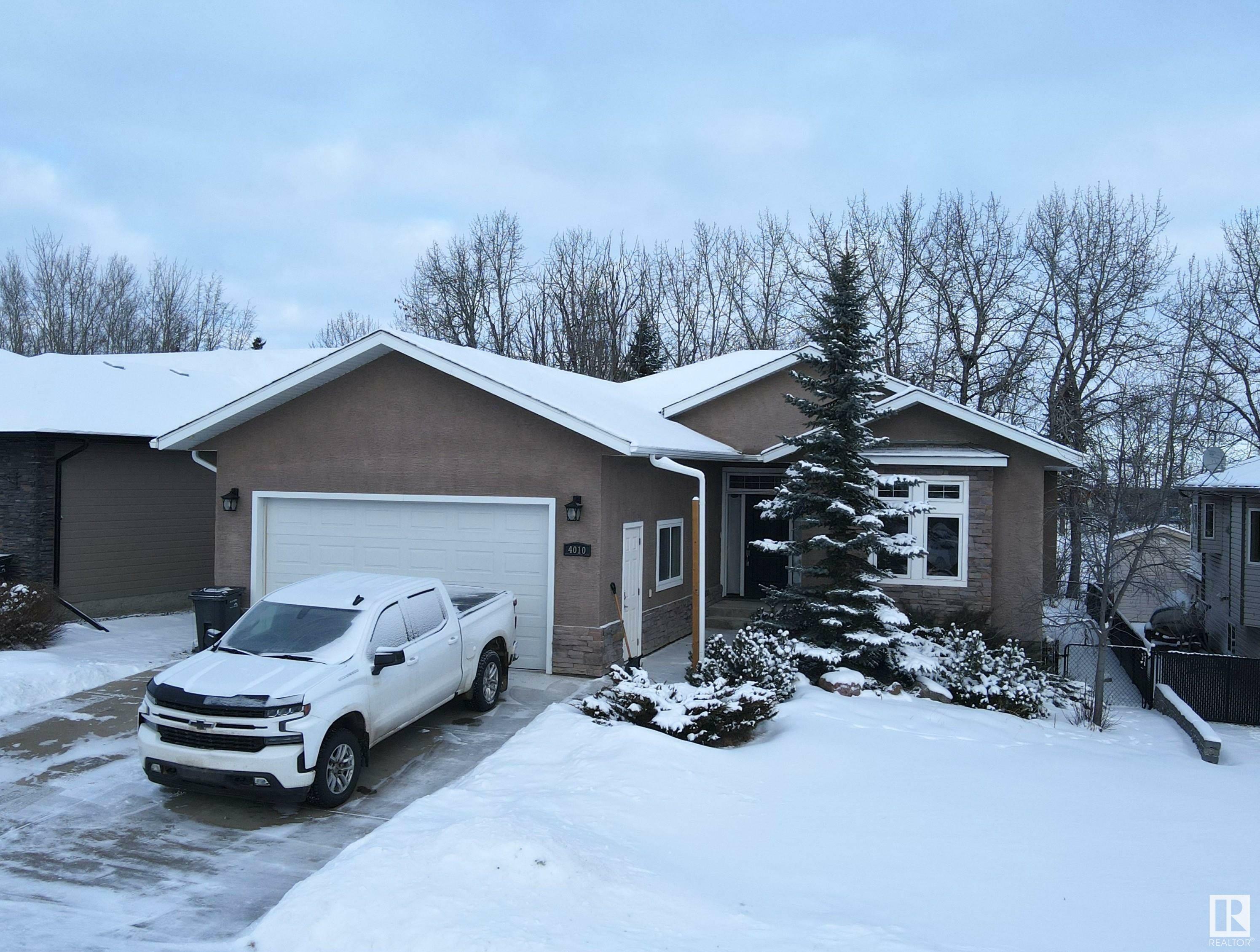 Property Photo:  4010 47 Avenue  AB T7A 0A8 